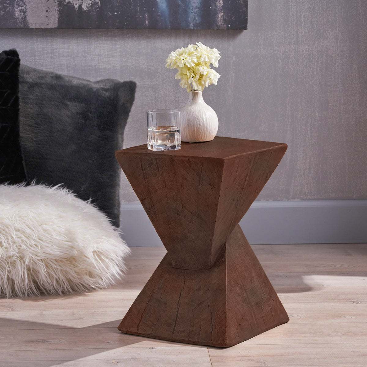 TESS dark brown side table with a sculptural hourglass base