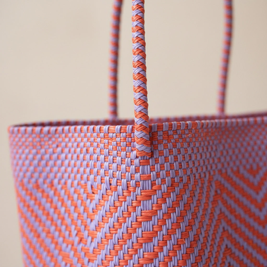 Chevron woven tote close-up with braided rope handles and textured weave