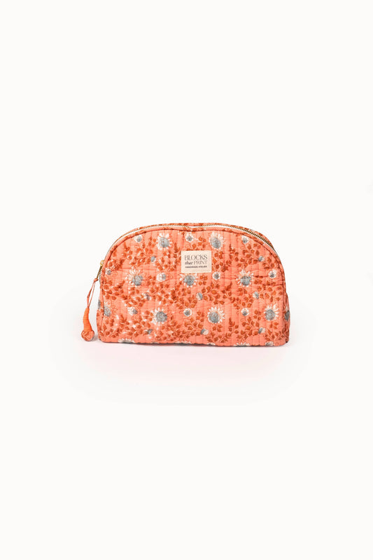 Terracotta quilted block-print travel pouch with zipper and drawstring cord