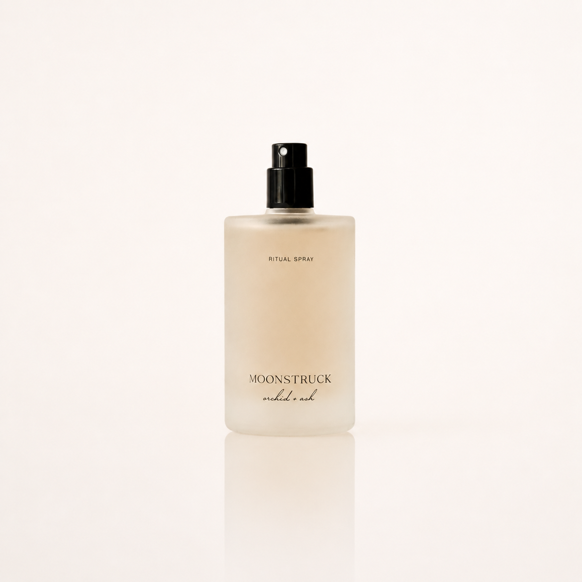 MOONSTRUCK ritual spray bottle with black pump, frosted bottle body