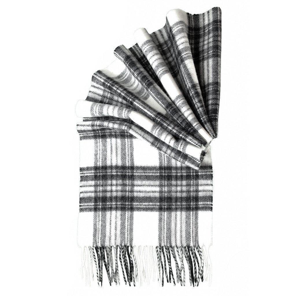 Merino lambswool tartan scarf folded showing grey and black plaid and white fringes