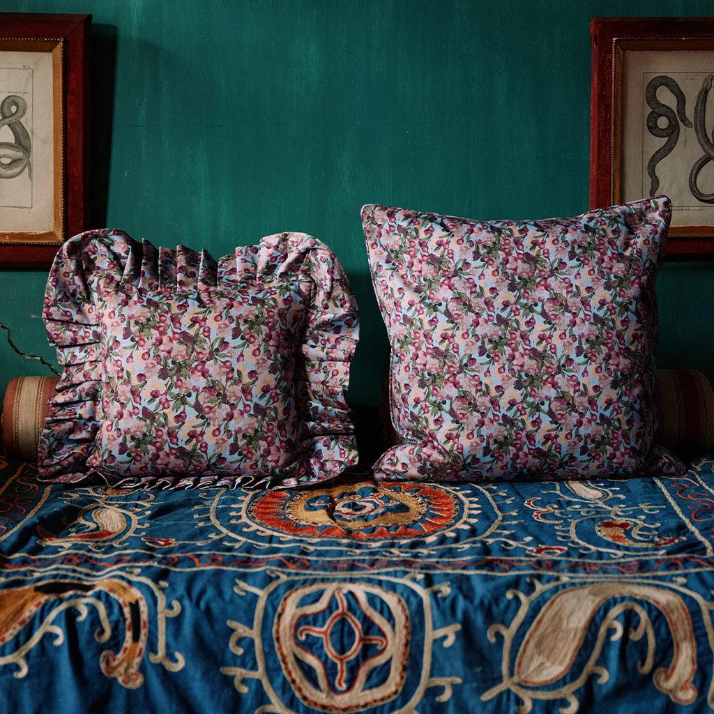 Pair of ruffled floral pillow covers, pink-purple blossoms with gathered edges