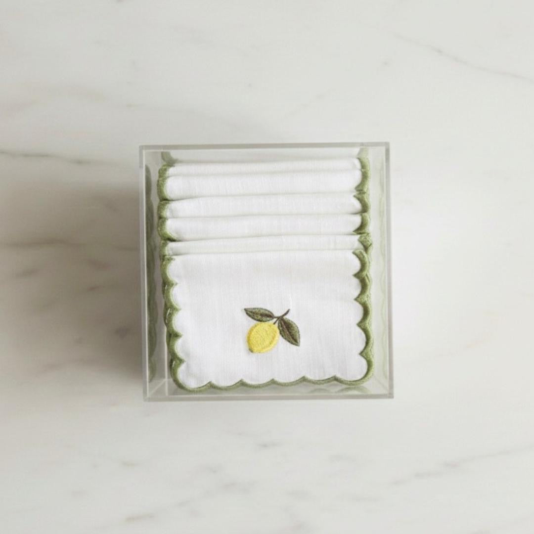 Set of 6 embroidered cocktail napkins in clear box, white fabric with scalloped green lemon stitch