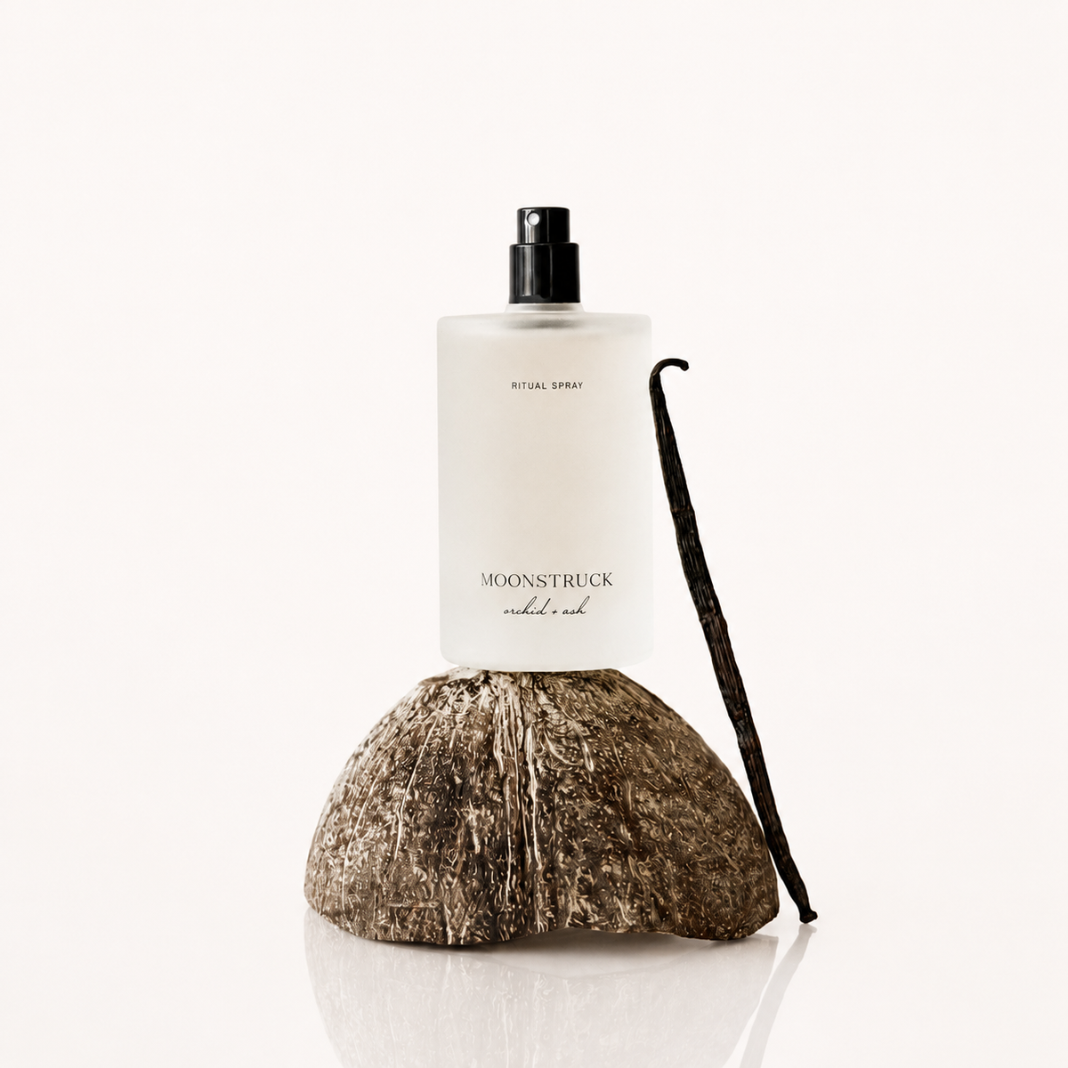 MOONSTRUCK ritual spray bottle with black pump and vanilla bean