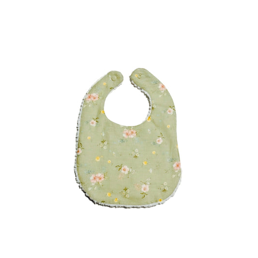 Infant linen bib in sage green with small floral print and stitched gray edge trim