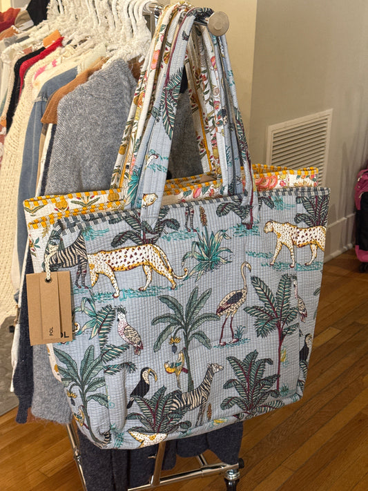 Quilted jumbo tote bag with colorful jungle floral print and sturdy fabric handles