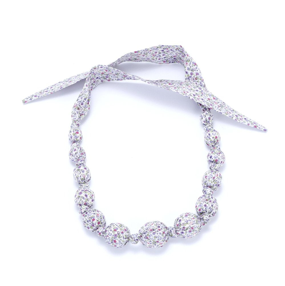 Girls' lavender floral fabric necklace with fabric-covered beads and tie ends