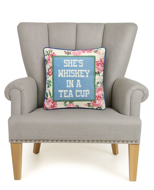 Square floral embroidered accent pillow with blue “She’s Whiskey in a Tea Cup”