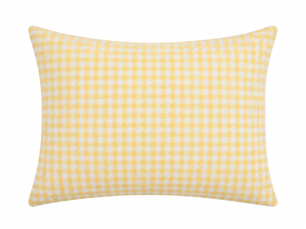 Pillowcase with a yellow and white gingham check pattern