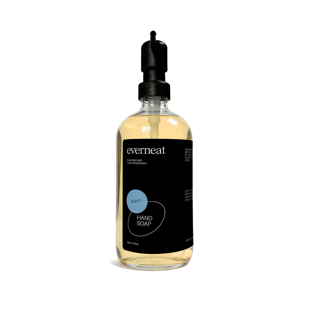 Clear hand soap in glass bottle with black pump lid