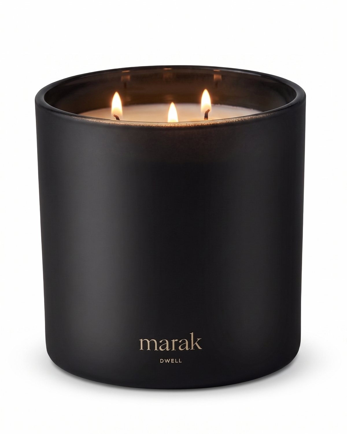 Lit marak candle in matte dark container, centered front view