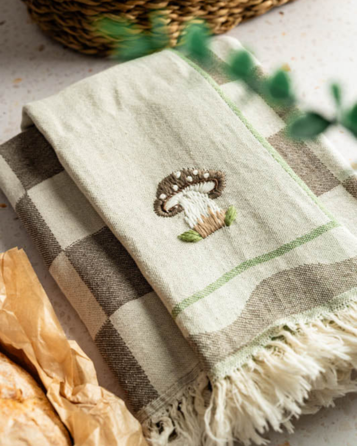 Tea towels with mushroom embroidery, beige-and-brown check plaid and fringed edge