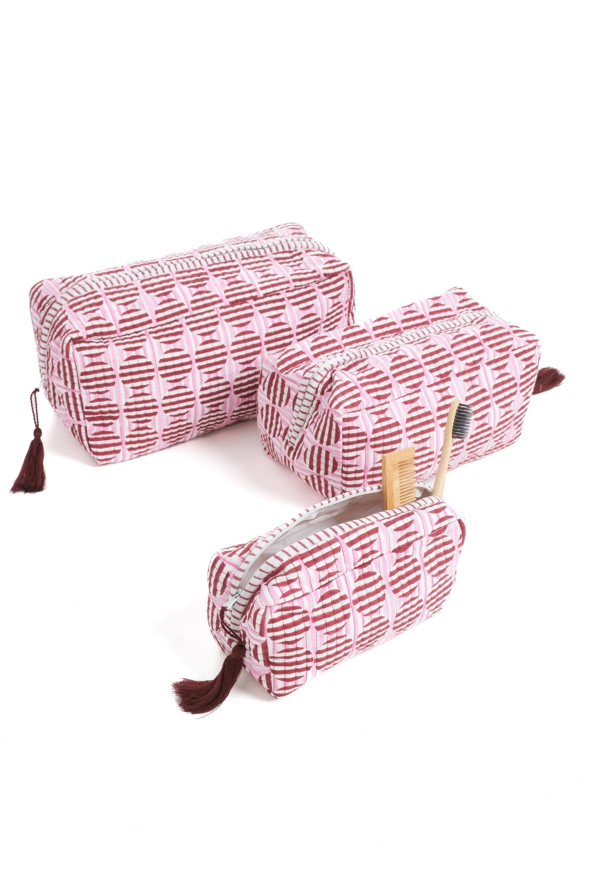 Burgundy and pink striped blockprint makeup bag with tassel pull and zip top