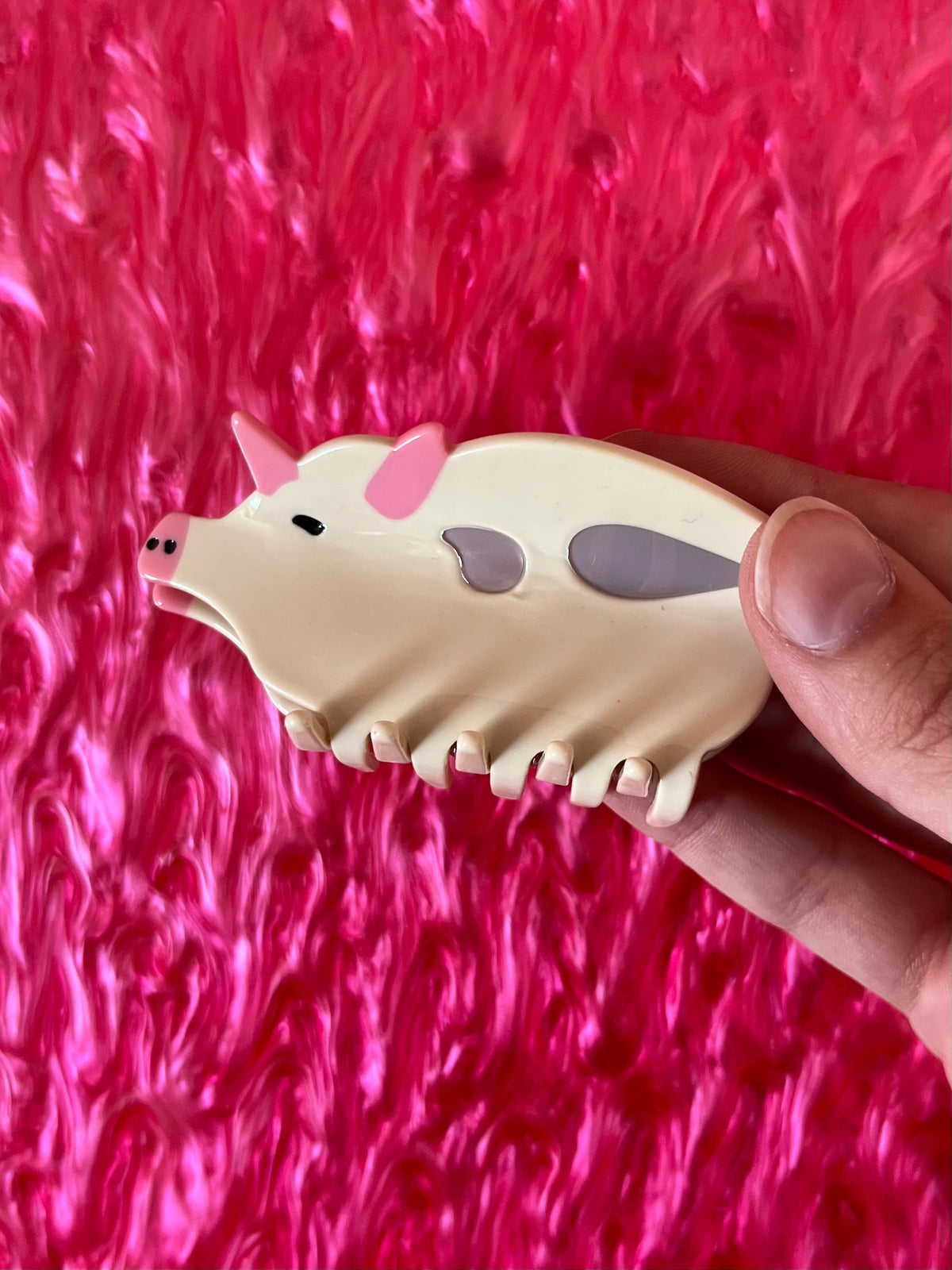 Hedgehog animal hair claw clip, cream base with purple-gray eye patches and snout
