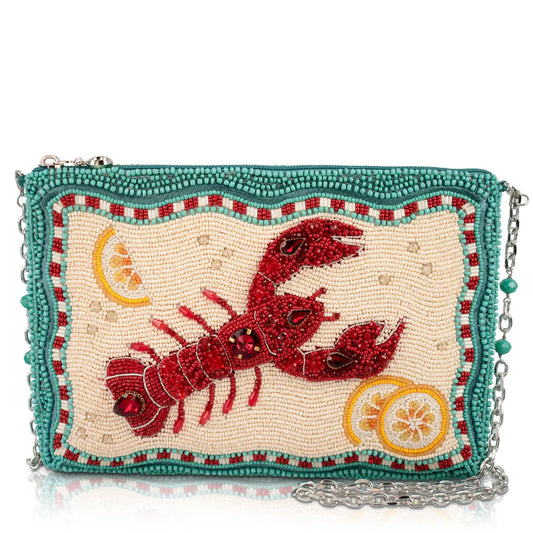 Beaded lobster handbag with teal frame, cream panel, red lobster and chain strap