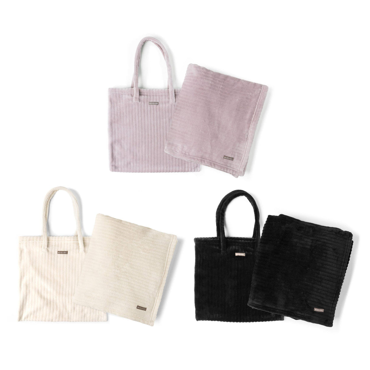 Hello Mello tote blanket sets in pink, cream, and black, each with a ribbed tote and folded blanket.