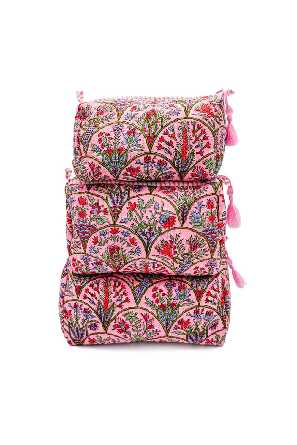 Toiletry bag with pink botanical arch print and tassel tie closures
