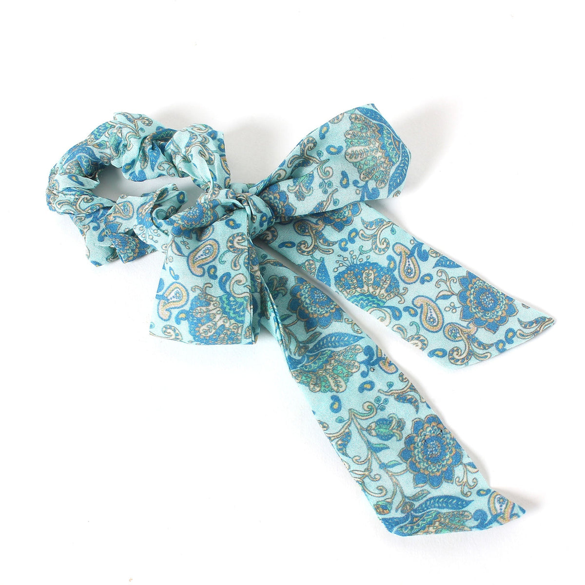 Turquoise hair scarf with paisley print, tied bow on a long ribbon
