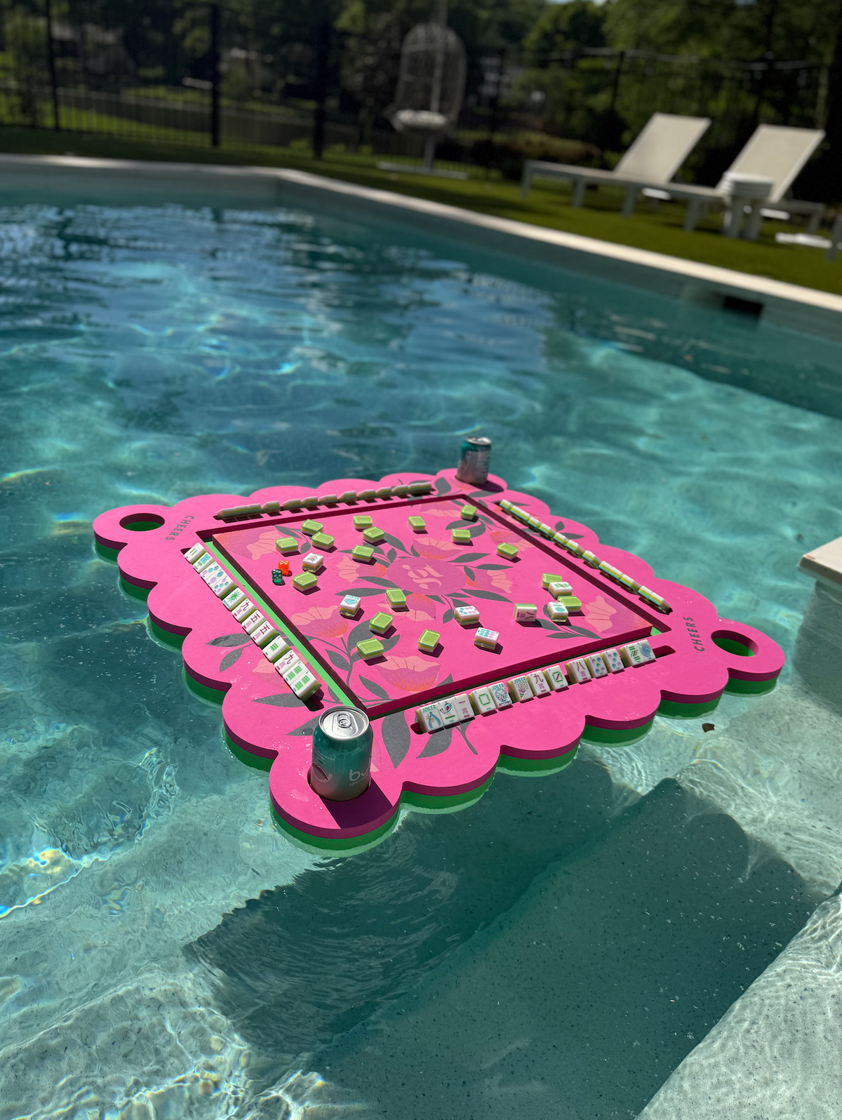 Neon floral pink floating mahjong tile mat, top view of tile layout and corner pegs