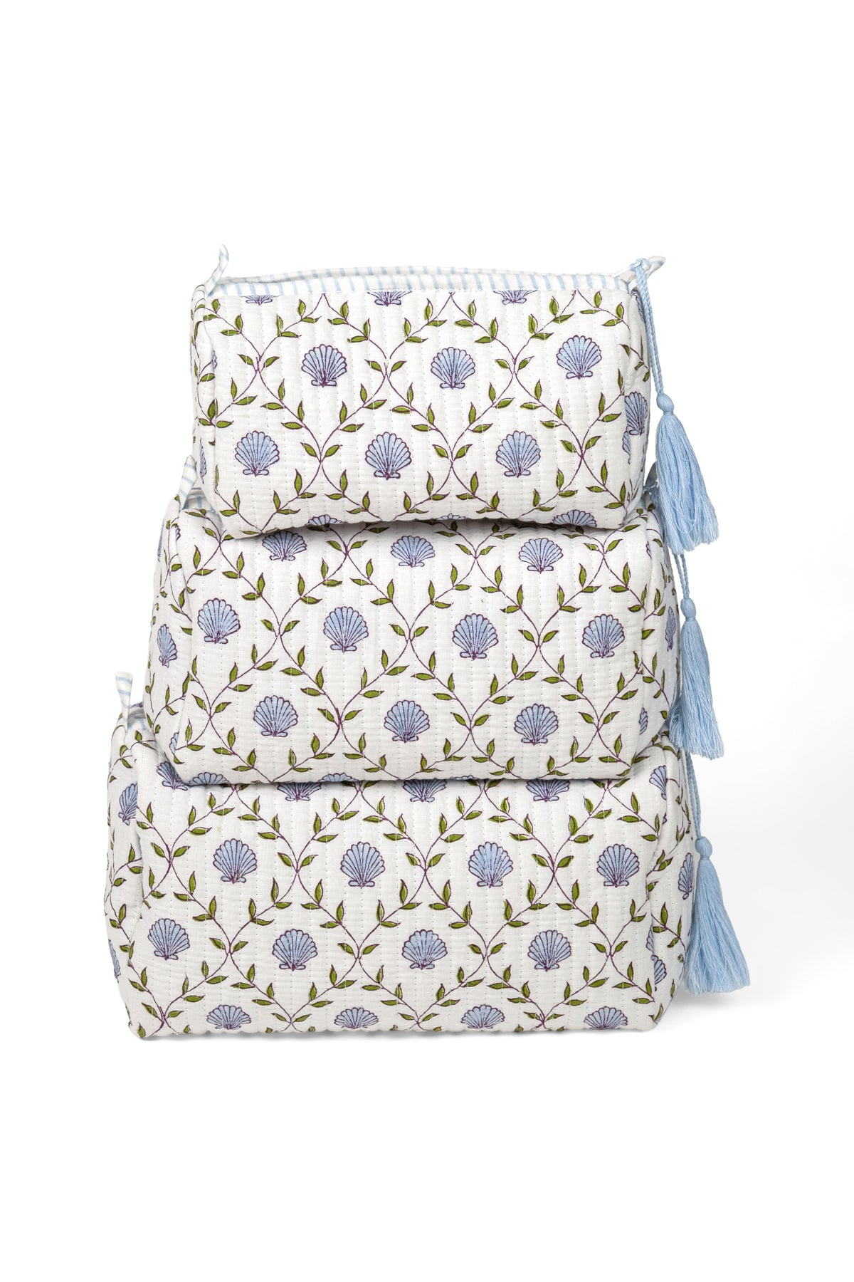 Set of two blockprint makeup bags, white with purple floral medallions, tassel side