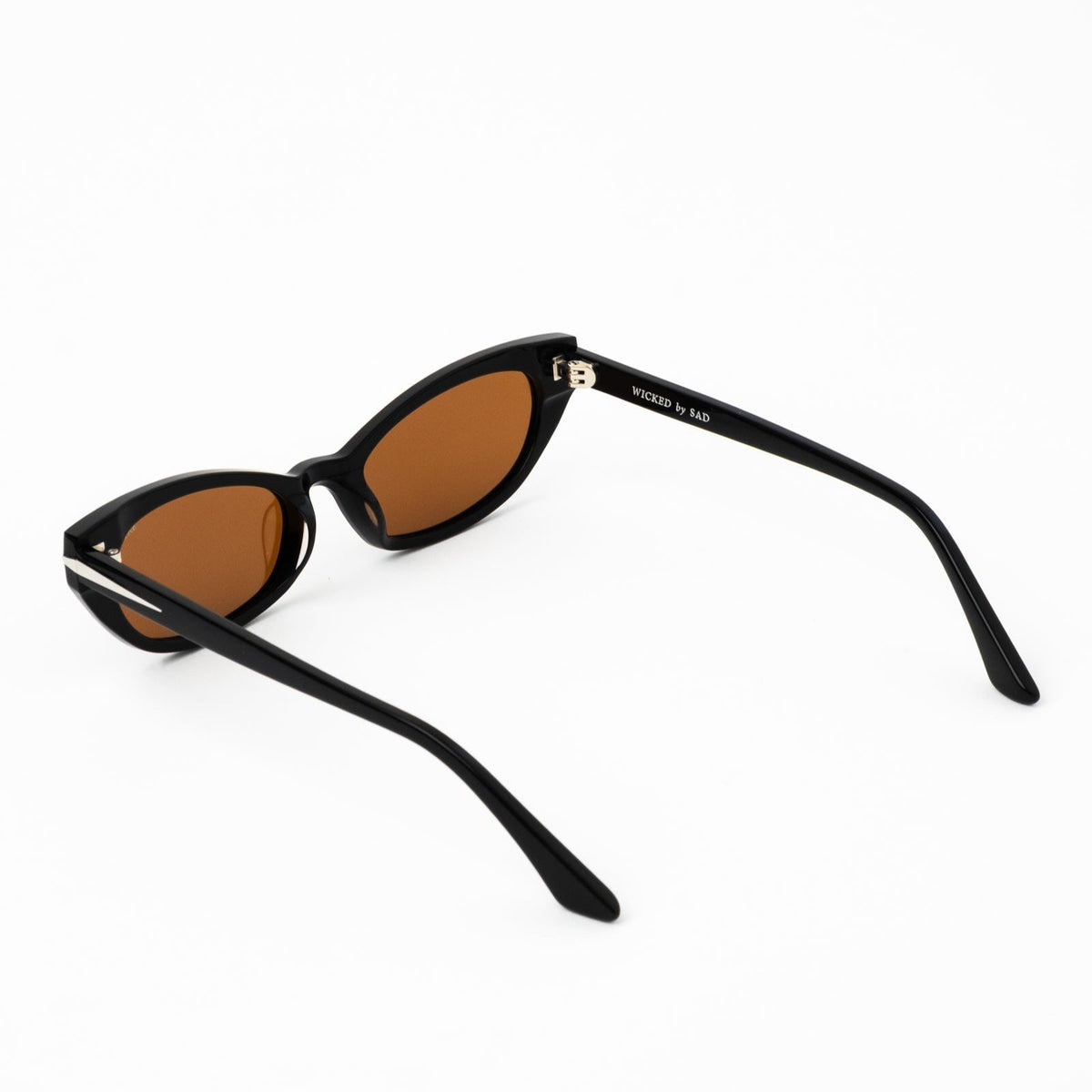 Black polarized sunglasses with bronze lenses, angled view with logo bridge.