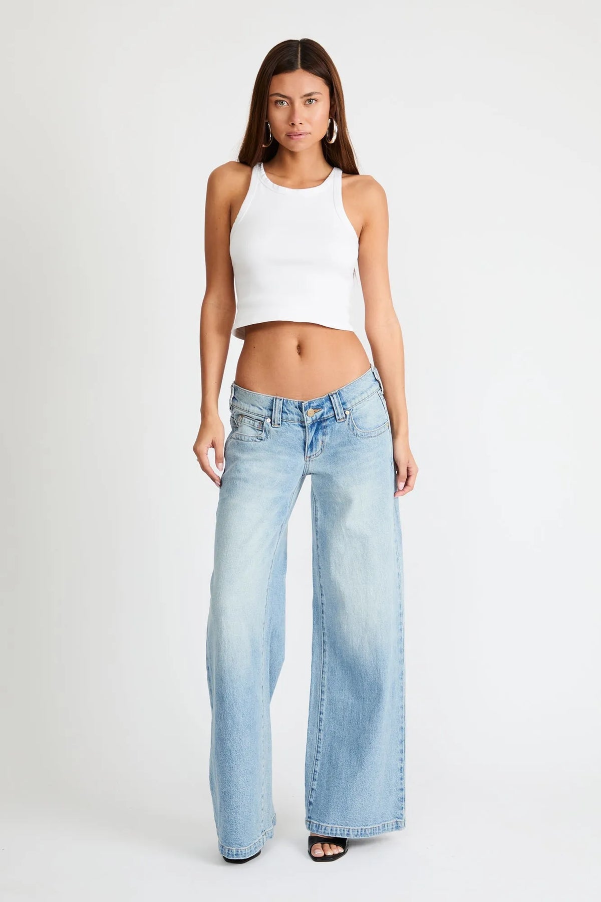 Light blue wide-leg low-rise jeans with front pockets and belt loops
