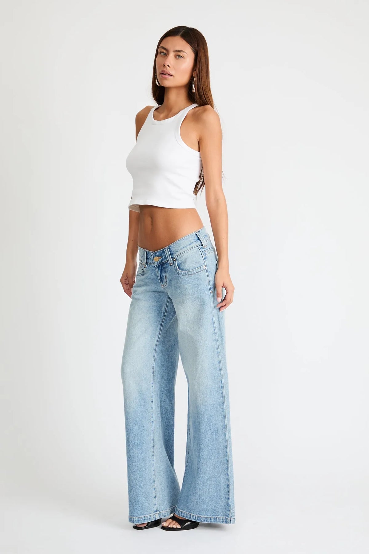 Light blue wide-leg low-rise jeans with straight wide legs and front fly