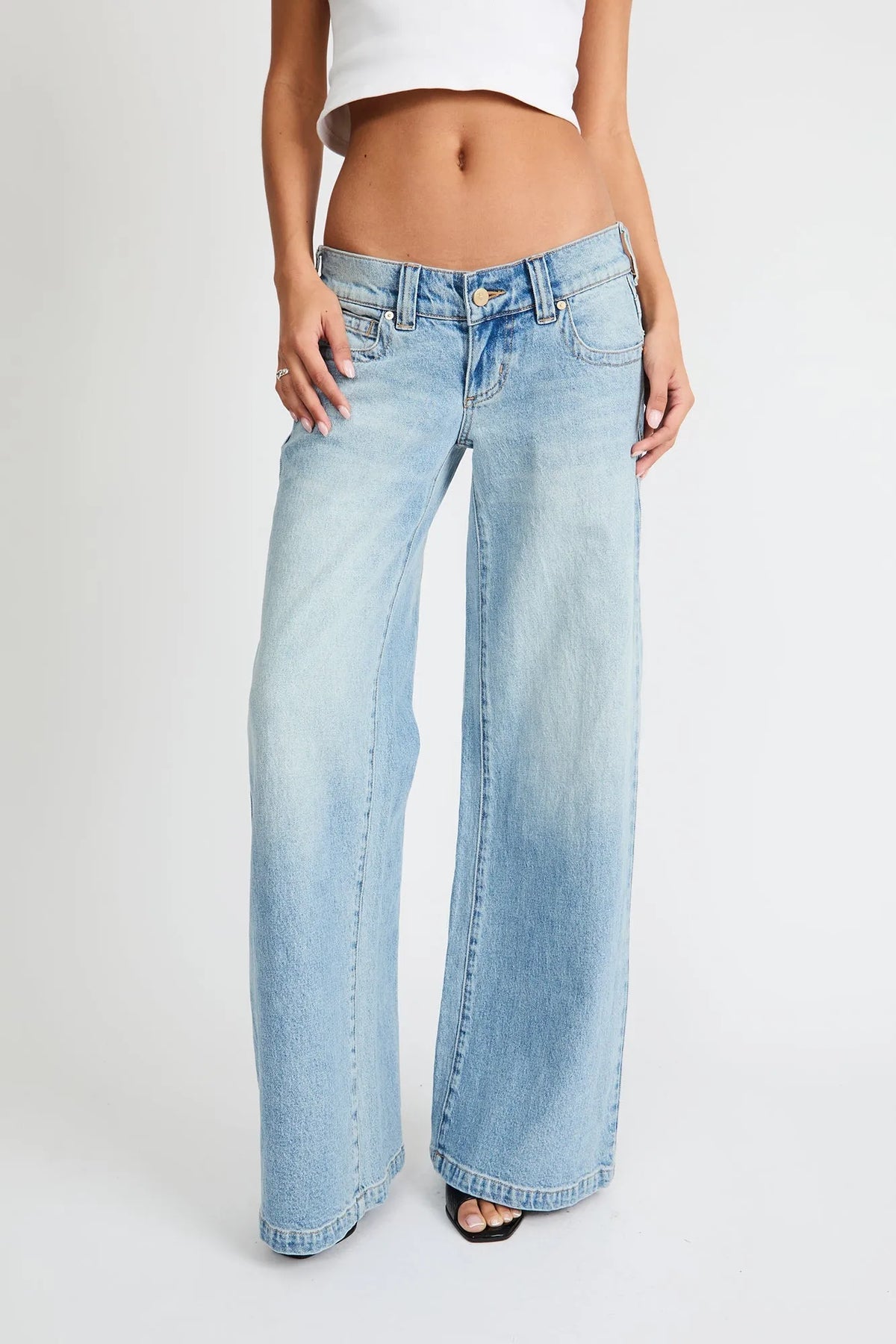 Light blue wide-leg low-rise jeans with button and belt loops