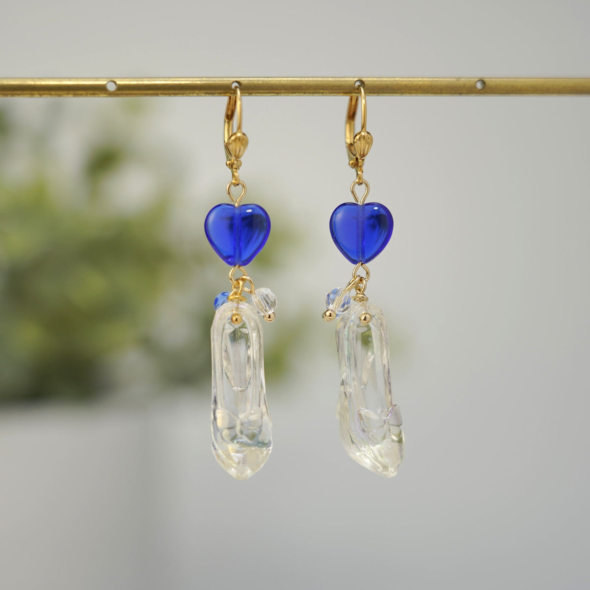 Cinderella glass slipper earrings with blue heart charms and clear dangling slippers