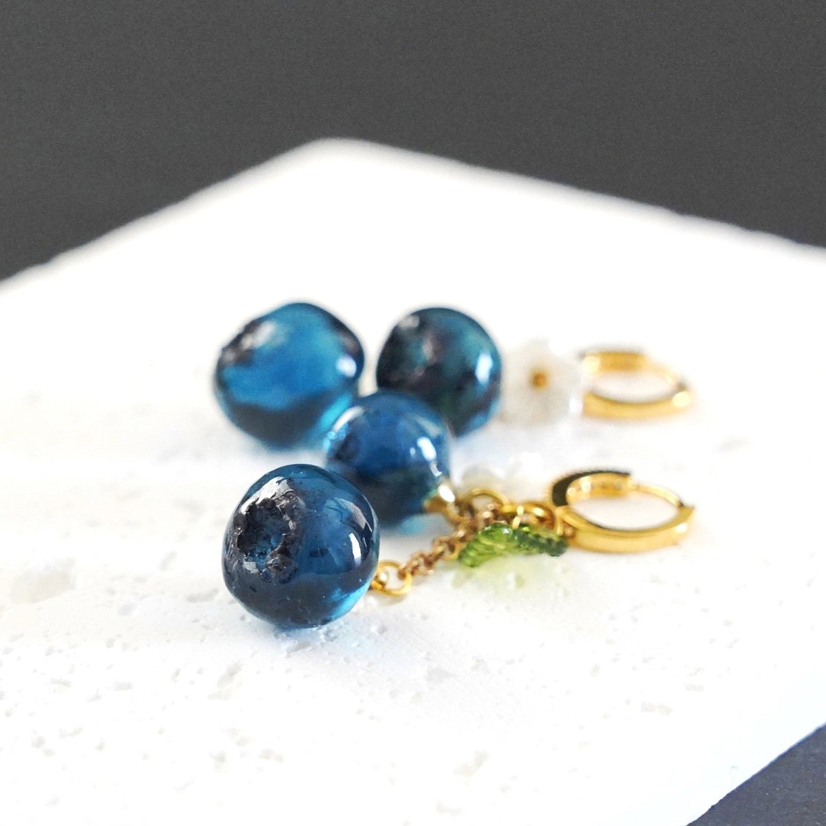 Blueberry cluster dangle earrings with blue resin berries and gold hoop hooks