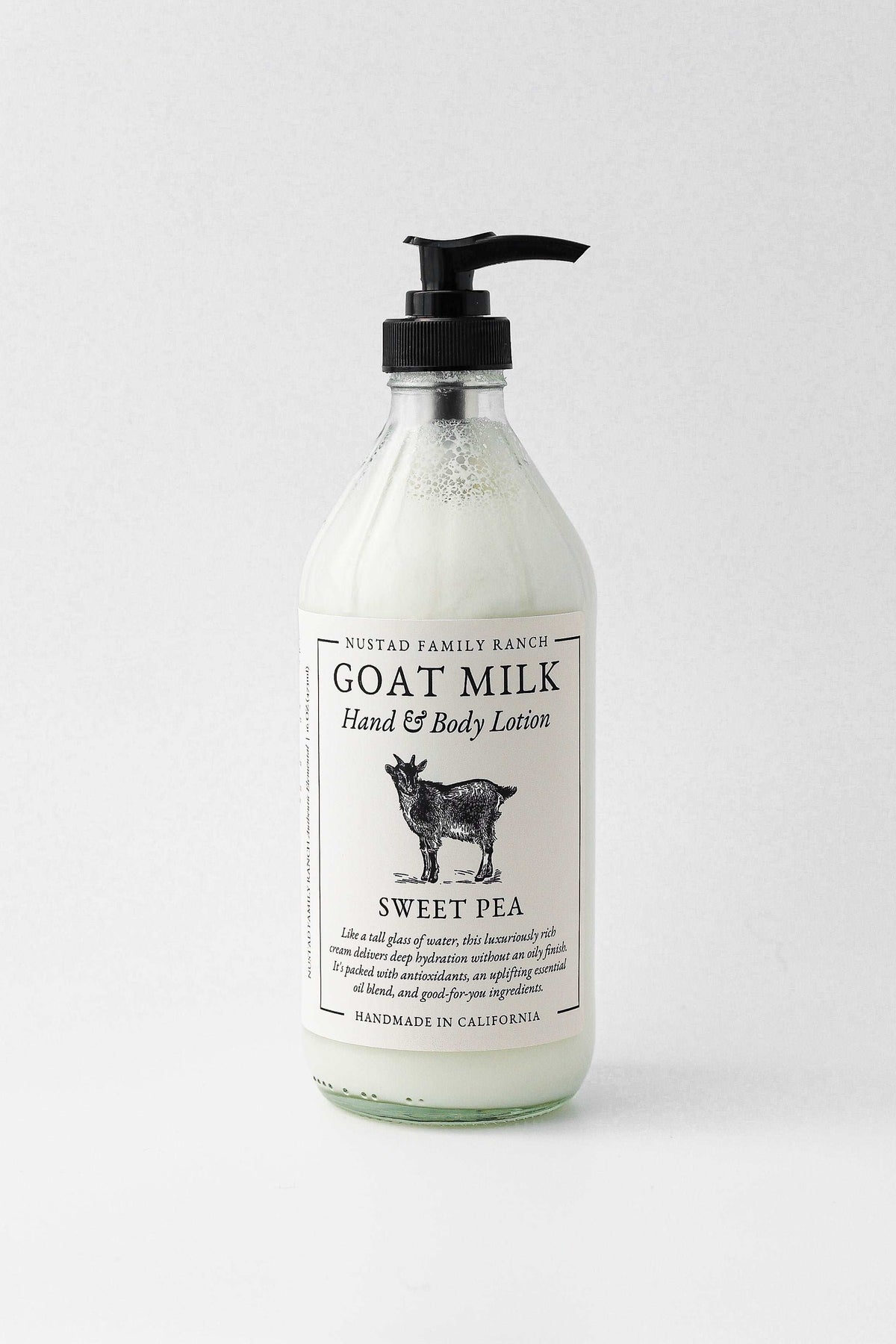 Goat milk hand and body lotion pump bottle, Sweet Pea scent label