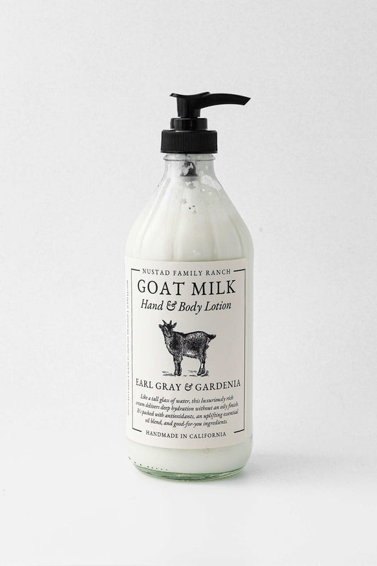Goat milk hand & body lotion in clear pump bottle, Earl Grey & Gardenia scent