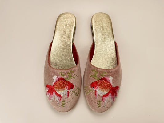 Pair of dusty pink velvet mule slippers with goldfish embroidery and gold insoles