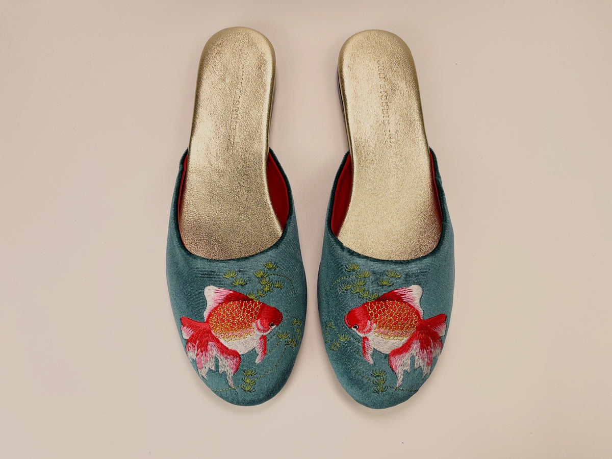 Pair of teal velvet mules with red and orange goldfish embroidery, beige lining
