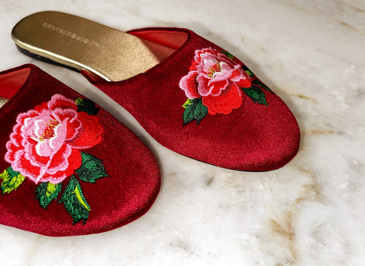 Pair view of red wine embroidered peony mule slippers with tan soles