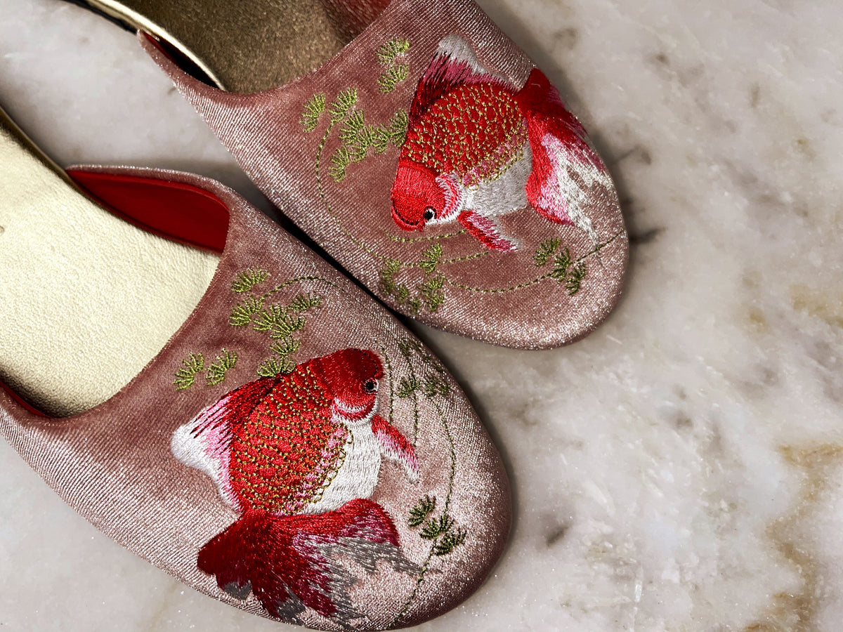 Dusty pink velvet mule slippers with close-up goldfish embroidery and gold insides