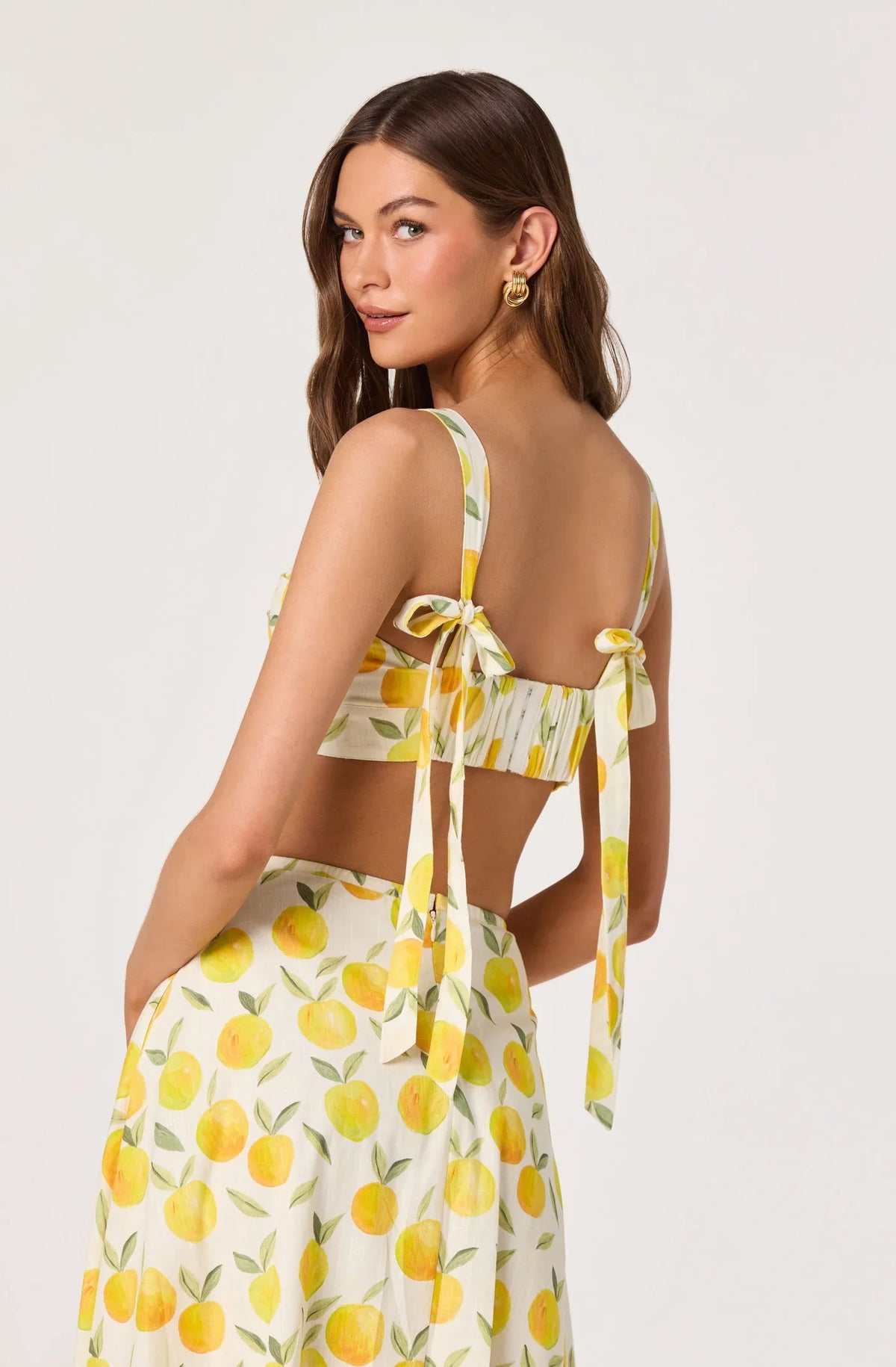 Lemon print crop top with tie-back straps and bow detail