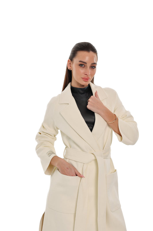 Ivory belted overcoat with wide lapels and large front patch pockets