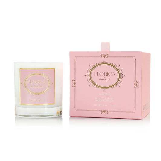 Florica Jude Rose scented candle in clear glass with pink front label