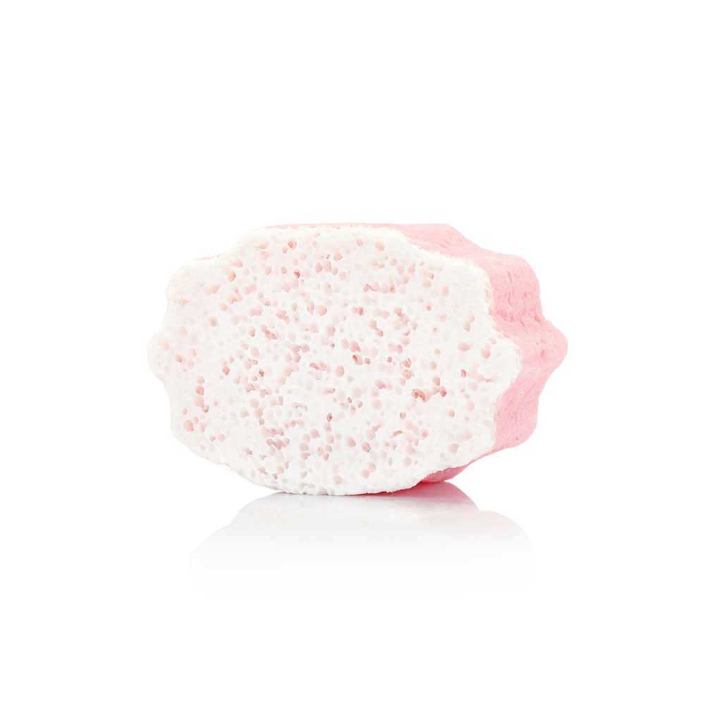 White and pink foot buffer sponge with textured exfoliating surface