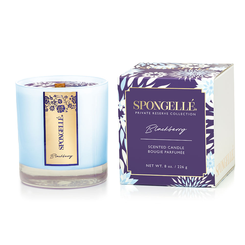 Scented candle in frosted blue glass jar with blackberry label and matching box