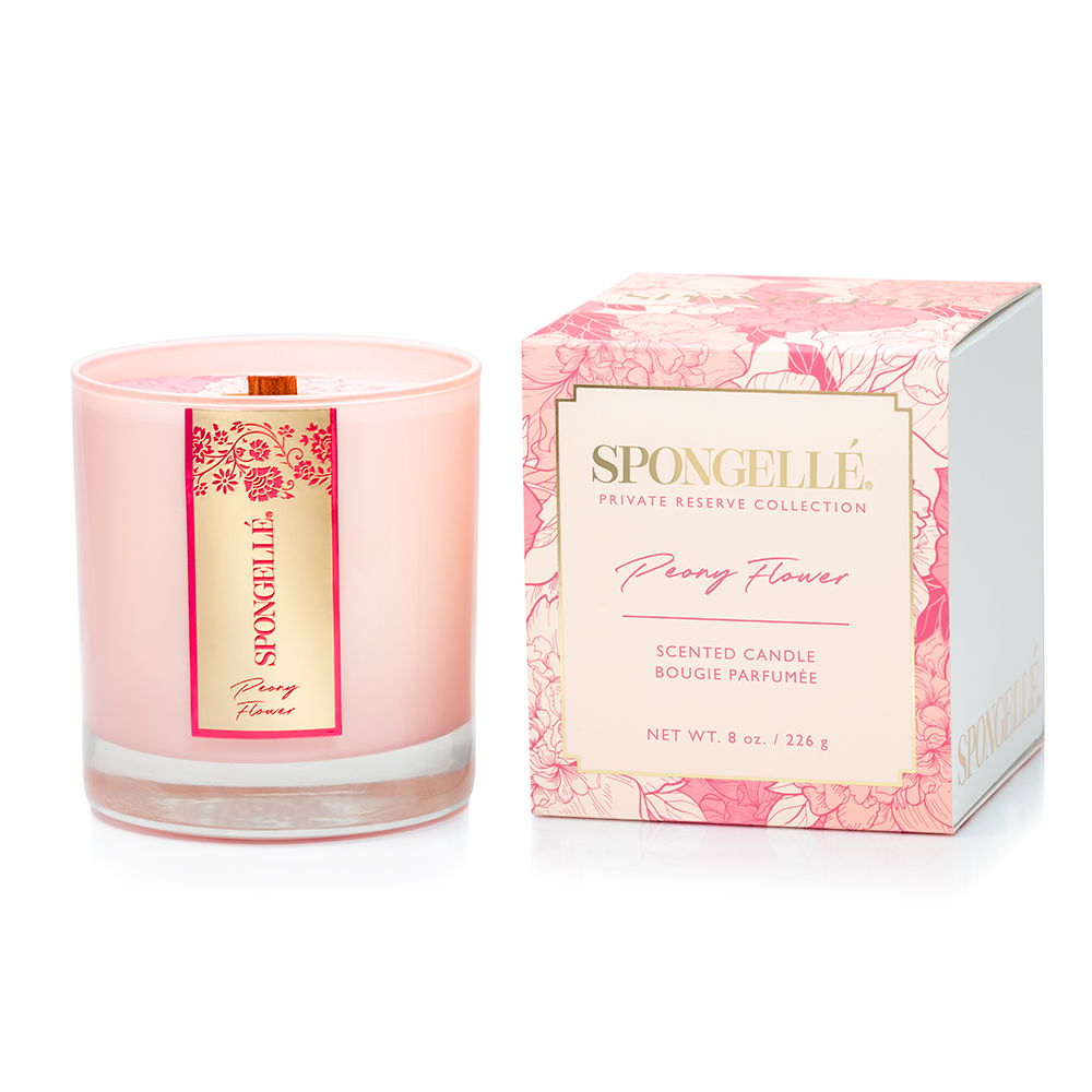 Pink scented candle in glass with floral label and matching gift box