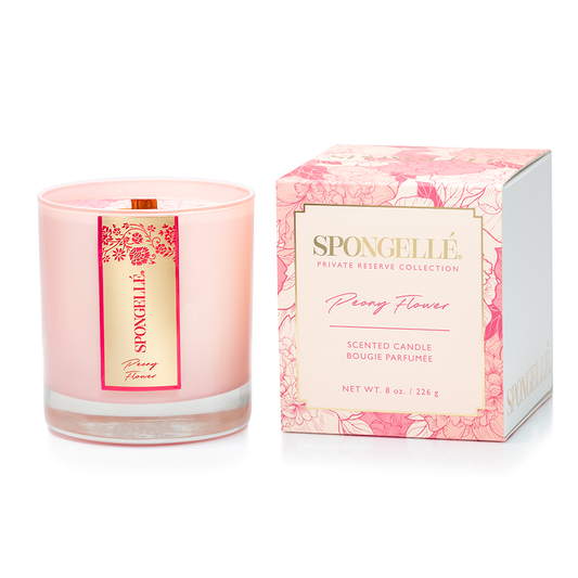 Pink scented candle in glass with floral label and matching gift box
