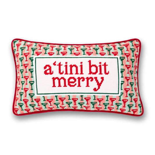Mini rectangular needlepoint pillow: 'a tiny bit merry' text, red trim and green accents