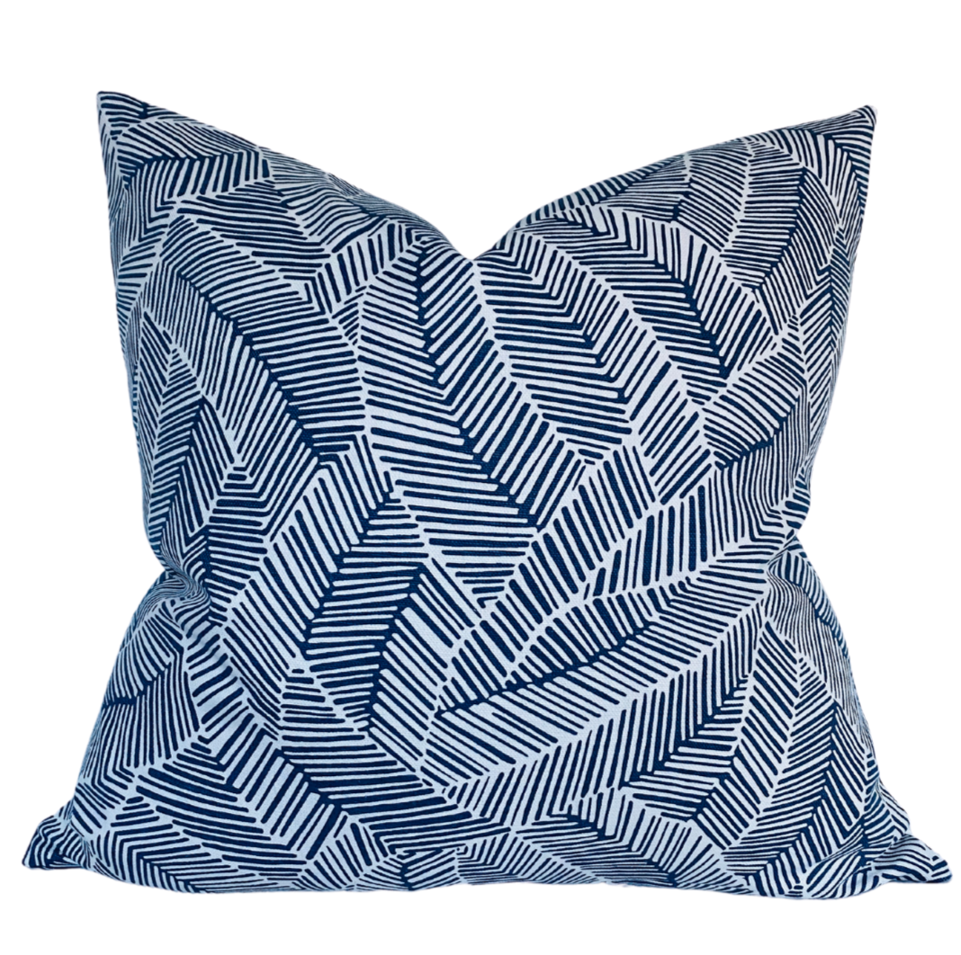 Blue abstract leaf patterned pillow cover with bold geometric lines