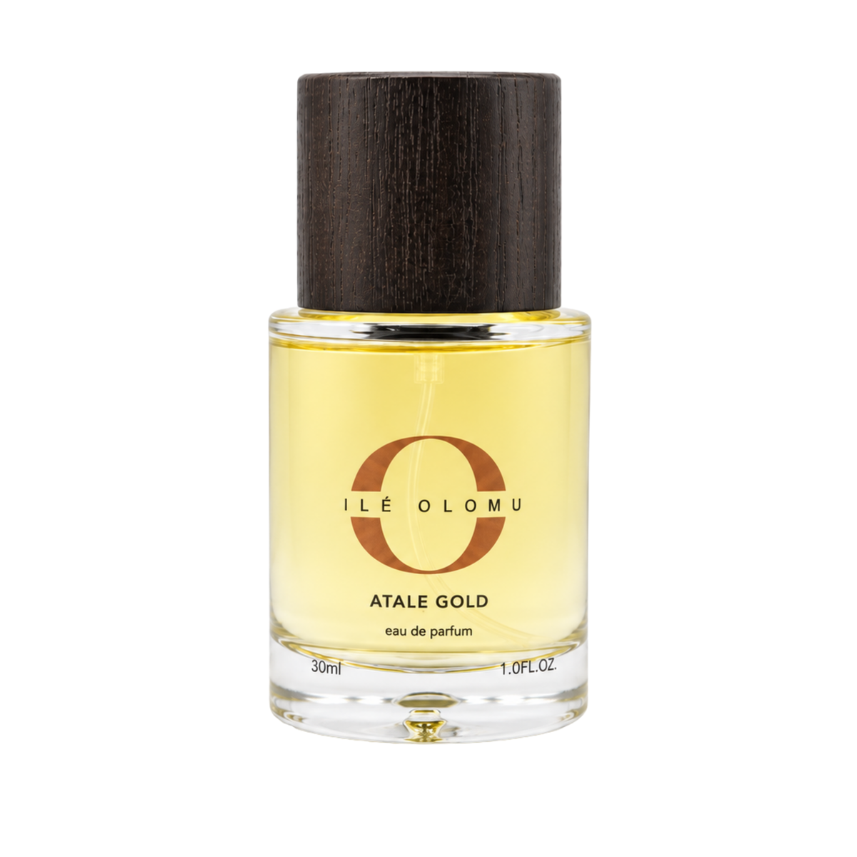 Atalẹ Gold eau de parfum bottle with dark wood cap and gold liquid