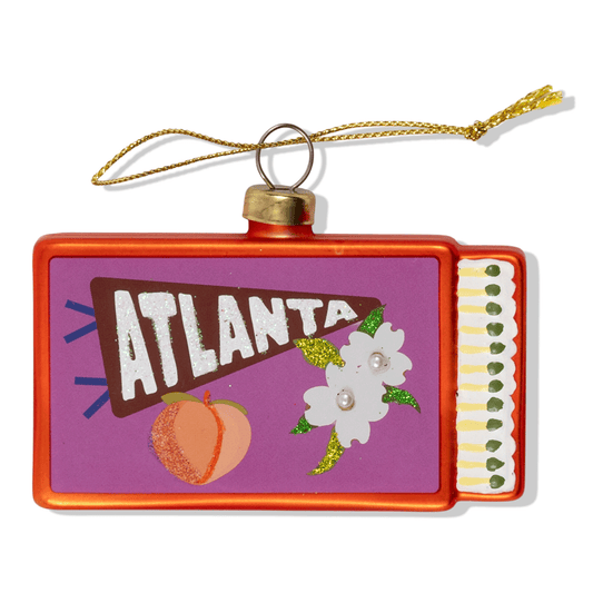 Atlanta matchbook ornament with red frame and gold hanging tassel