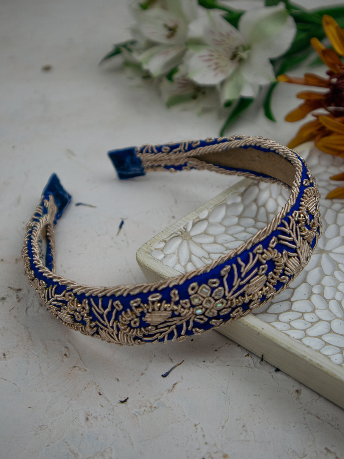 Aurelia Filigree Headband with blue fabric and raised gold embroidered floral motifs
