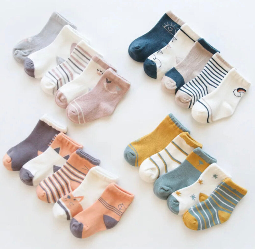 Assorted kids organic cotton socks: stripes, solids, and printed character designs