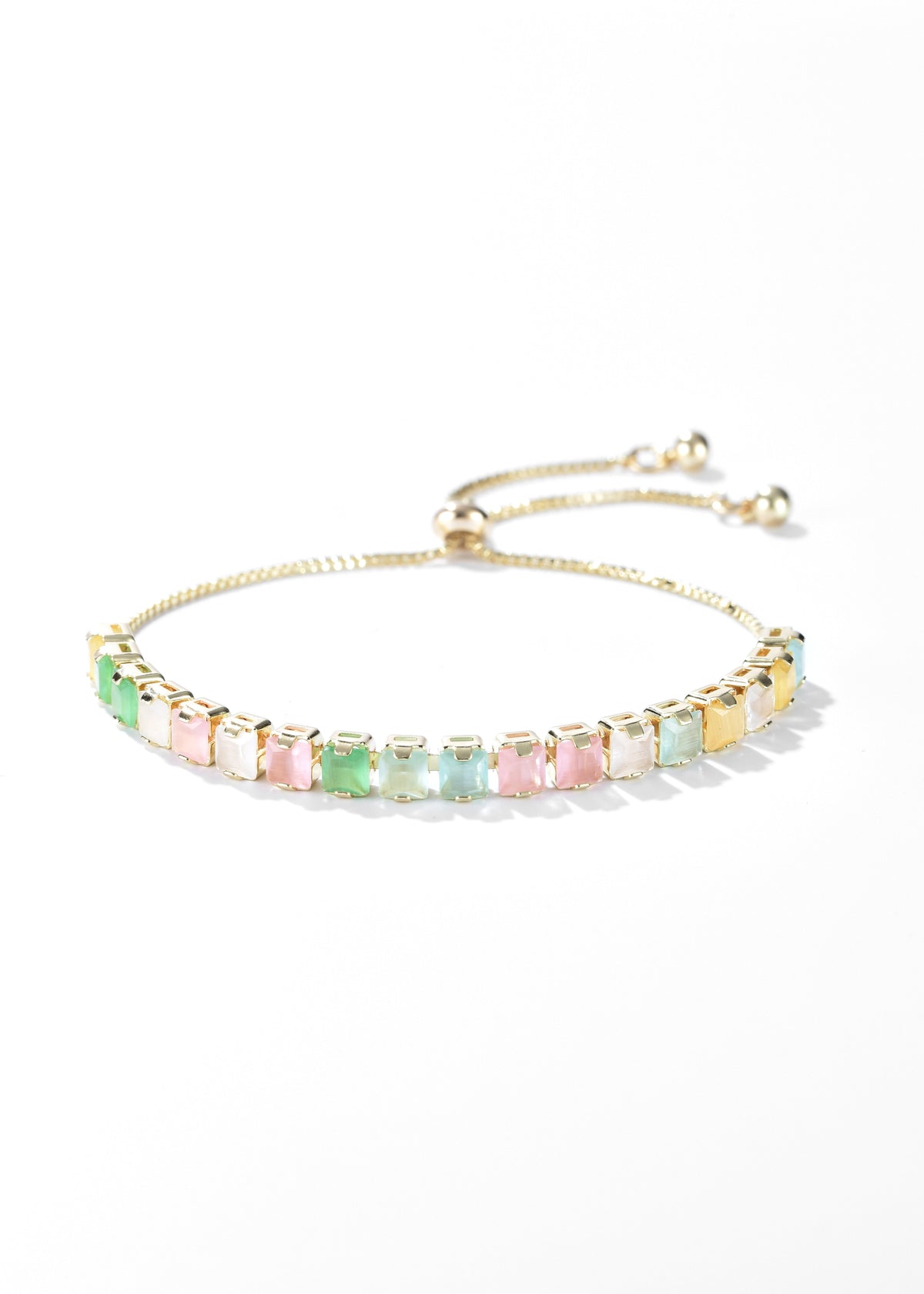 Gold-tone bracelet with a row of square pastel pink, green, and clear stones